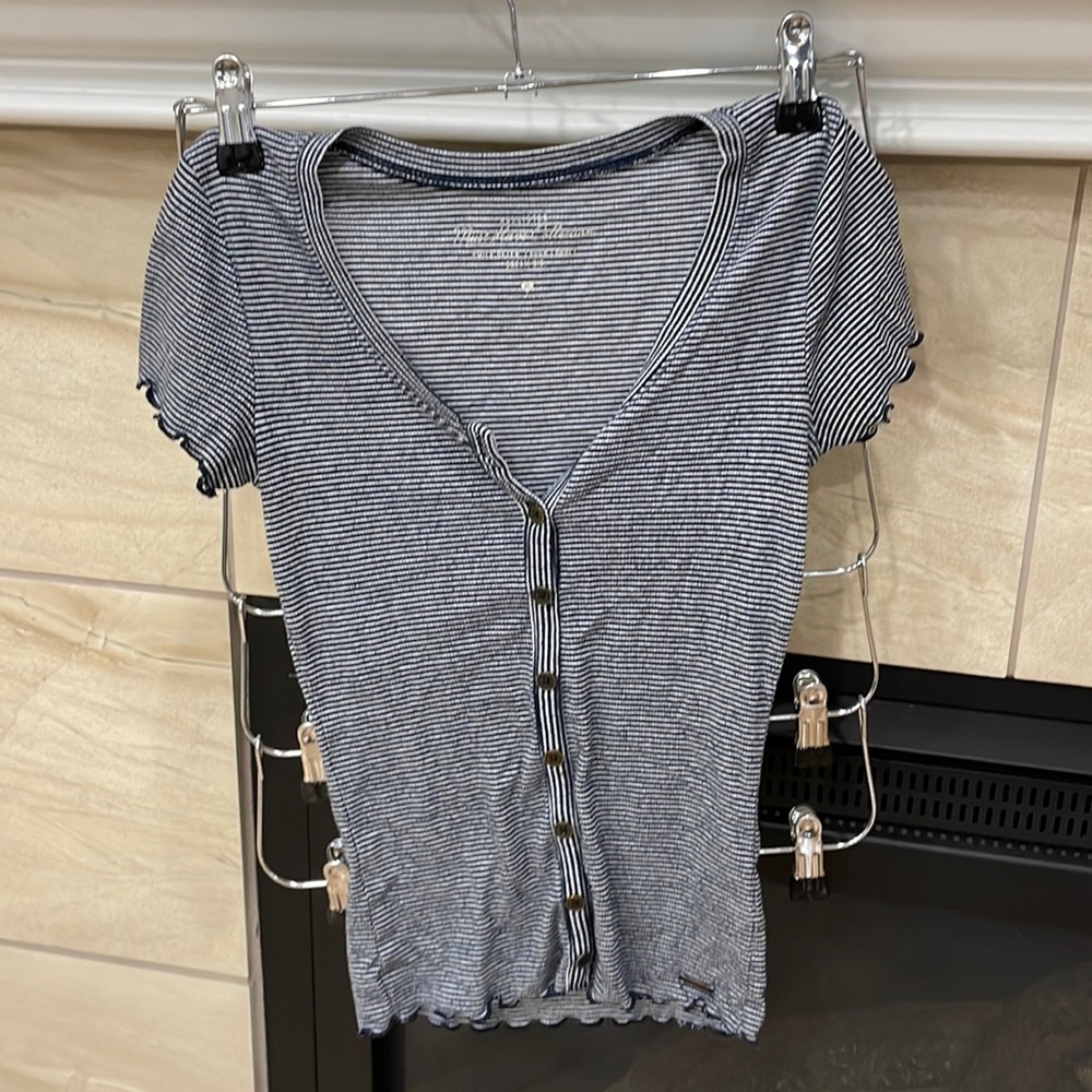 black and white striped fake button down top from hollister in size xs